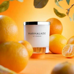 Marmalade Of London Seville Orange & Clementine 230g Luxury Glass Soy Candle | New In -Campus Gifts Sales marmalade of london 12187 seville orange clementine 230g luxury glass candle lifestyle 1