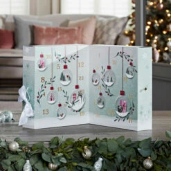 Yankee Candle Snow Globe Wonderland Advent Calendar Book - Festive Holiday Candles & Fragrance -Campus Gifts Sales yankee candle 1716520e advent book lifestyle